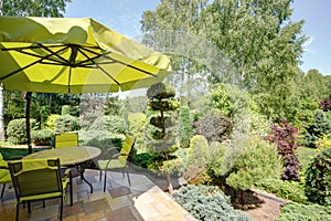 Garden furniture and umbrella