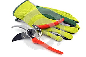 Garden gloves and shear on white isolated background