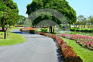 The garden has a colorful flower canal walkway.