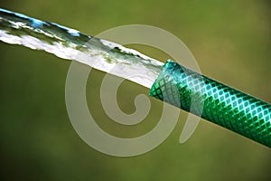 Garden hose shooting water