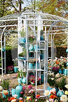 Garden house arbor with pots and flowers
