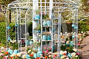Garden house arbor with pots and flowers