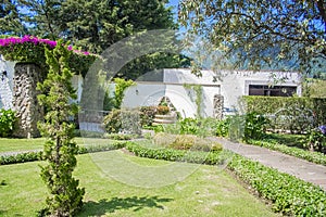 House with classic windows garden la quebrada quetzaltenango beautiful housewith flowers garden la quebrada xela photo