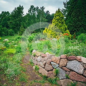 Garden Landscaping Design. Flower Bed, Green Trees