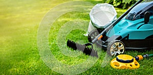 garden lawn care tools and equipment for perfect green grass. copy space