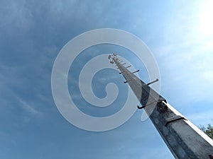 Garden light tower with blue sky and litle cloud