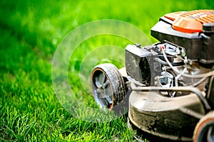 Garden maintainance details - close up view of grass mower