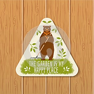 The garden is my happy place emblem, patch, sticker. Vector illustration. For sign, patch, shirt design bear with rake