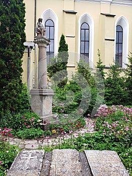 Garden of old church in Kamianets-Podilskyi city in Ukraine