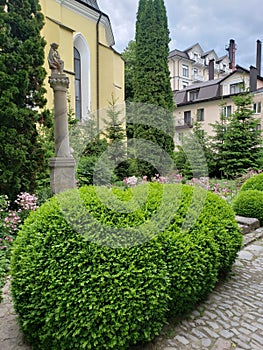 Garden of old church in Kamianets-Podilskyi city in Ukraine