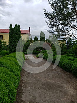 Garden of old church in Kamianets-Podilskyi city in Ukraine