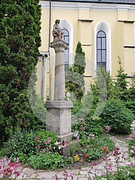 Garden of old church in Kamianets-Podilskyi city in Ukraine