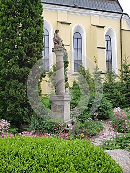 Garden of old church in Kamianets-Podilskyi city in Ukraine