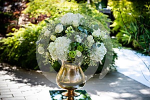 Garden party. Wedding decor table setting and flowers. Wedding Flower Arrangement Table Setting Series