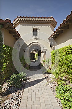 Garden path leading to residential front gate