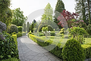 Garden path in formal garden with morning light