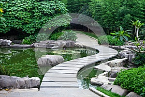 Garden path by pond photo