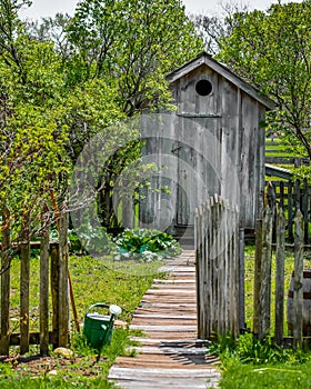 Garden Path with Wooden Outhouse