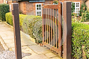 The garden pedestrian gate and exterior of a typical English residential old London town house