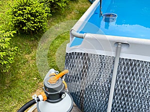 Garden pool with sand filter system