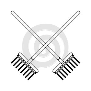 Garden rakes tools crossed black and white