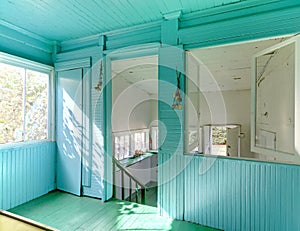 Garden rbright oom with blue and white walls.