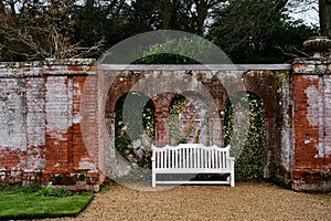Garden Seat by Old Wall, Blickling Hall, nr Aylsham, Norfolk, England, UK