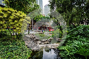 Garden and skyscrapers at Greenbelt Park, in Ayala, Makati, Metr