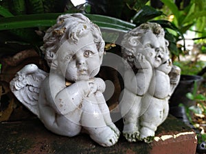 Garden statues girls sad in thailand