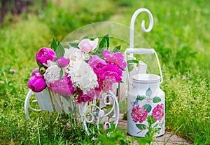 Garden still life with delicate peonies