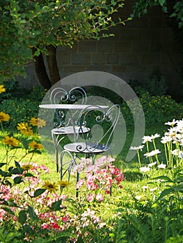 Garden: sunlit table and chairs