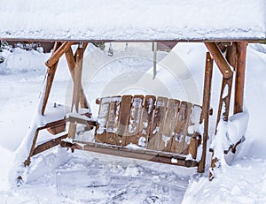 Garden Swing covered in Snow