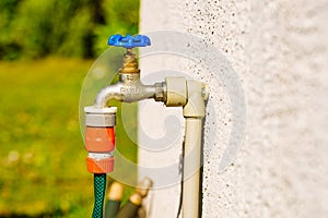 Garden tap with hosepipe attached