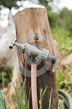 Garden tap showing a single drop