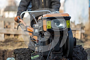 Garden tiller to work, walk-behind tractor