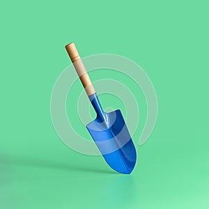 Garden tool. Blue blade on a green background