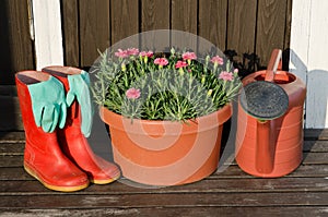 Garden tools:flower pot,watering can,rubber boots