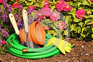 Garden tools on green grass in garden