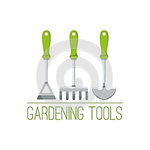 Garden tools logo with hoe, rake and trowel.