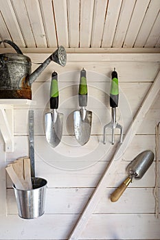 Garden tools in a small storage shed