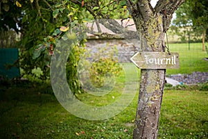 Garden view with a welcoming sign 