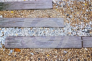 Garden walk. sea stone with pathways made of Timber