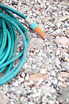 Garden water hose outdoor sand