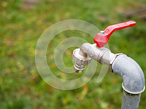 Garden water tap close up shot, shallow depth of field