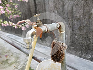 Garden water tap faucets and coconut husk brush