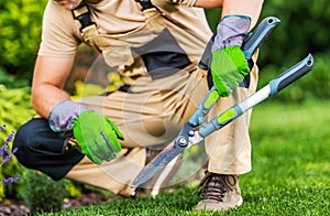 Garden Worker with Large Manual Hedge Trimmers