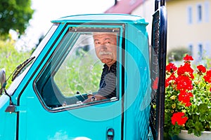 Gardener delivering flowers with truck