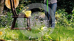 Gardener in English flower garden