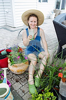 Gardener enjoying a refreshing iced drink