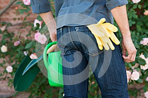 Gardener With Gardening Tools In Hand